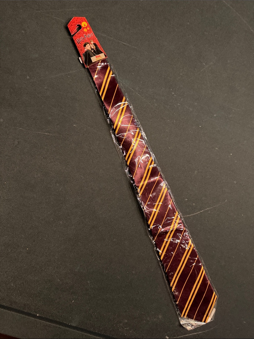 Warner Bros. Maroon Harry Potter Tie with Gold Stripe Pattern